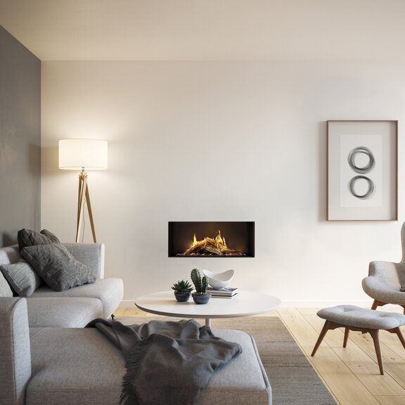 Insert à gaz VISIO 100 avec vitre frontale dans un mur blanc et espace de vie décoratif