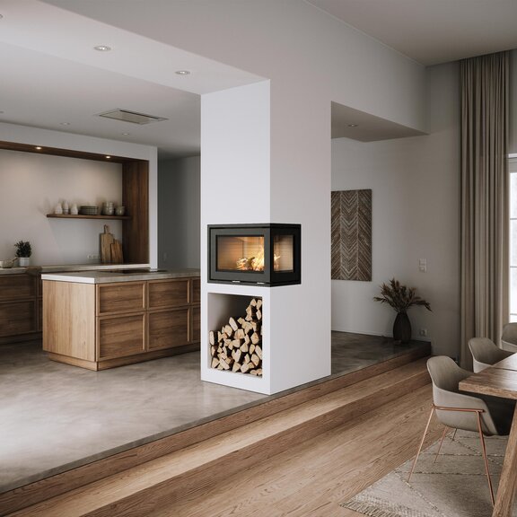 Insert de cheminée à bois R-500 bi-face, installé entre la cuisine et la salle à manger