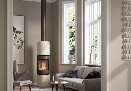 JUNO 166 L avec revêtement en pierre naturelle Porto et porte en acier de couleur mocca dans un salon moderne avec de grandes baies vitrées