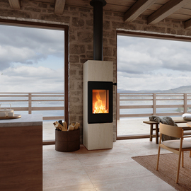 Holz Kaminofen NEXO 160 Porto in der Farbe Schwarz im Wohnraum mit einer Steinwand