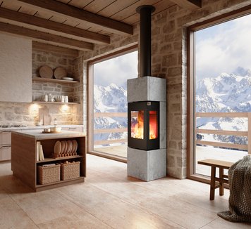 Holz Kaminofen NEXO 160 Speckstein in der Farbe Schwarz im Wohnraum mit Bergen 